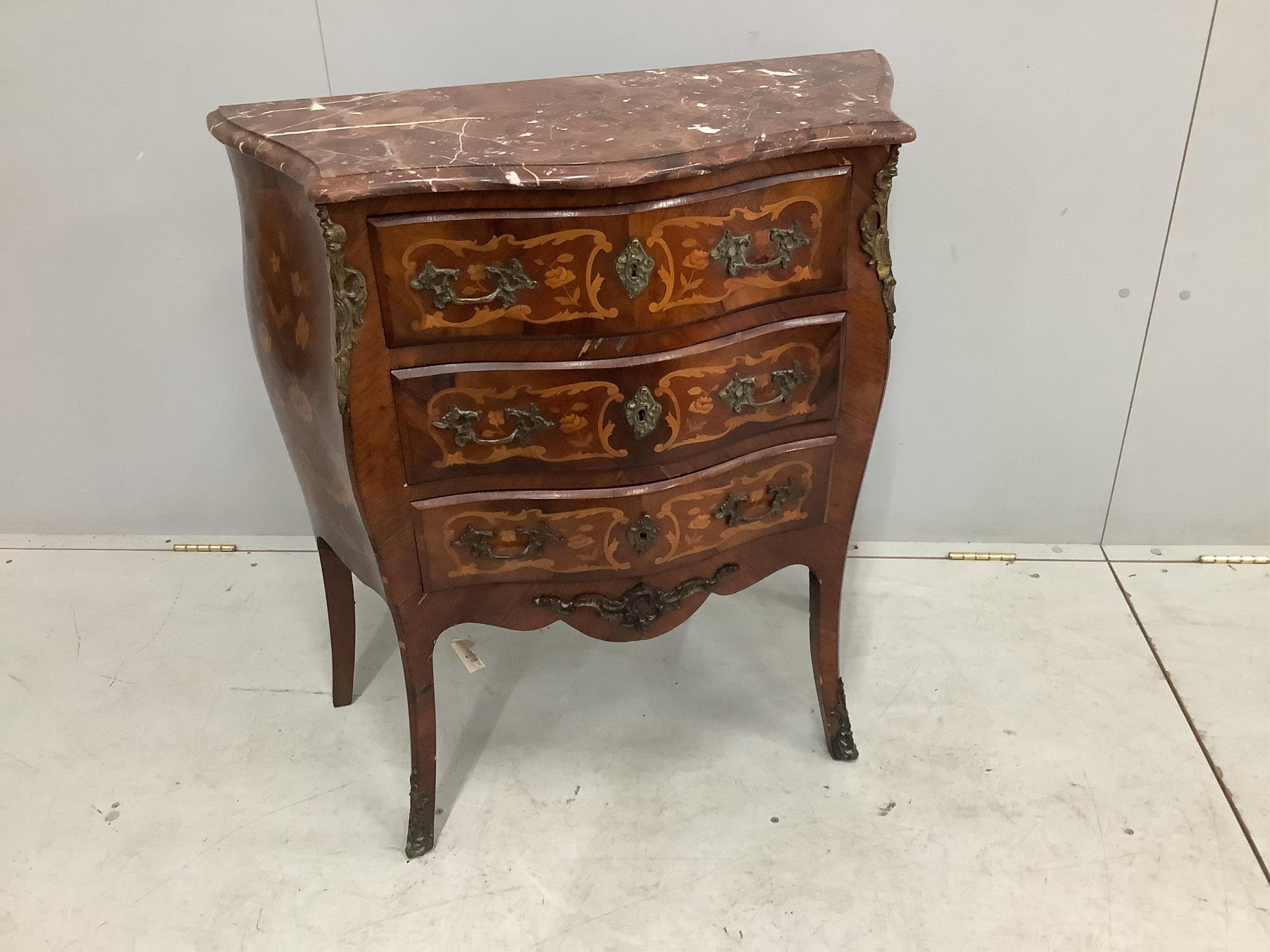 A small French gilt metal mounted marquetry inlaid marble topped bombe commode, width 80cm, depth 38cm, height 86cm. Condition - marble topped corner damaged but piece present